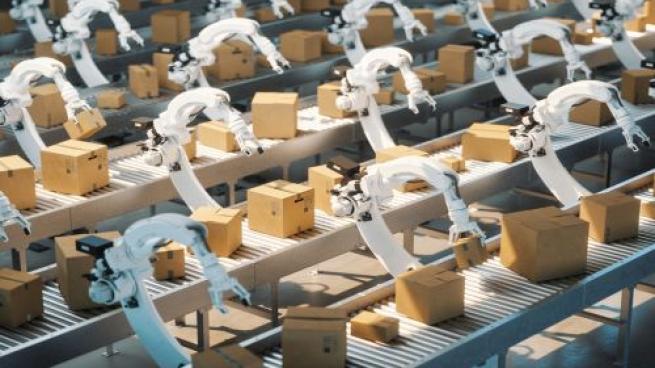 Robots preparing boxes for shipment